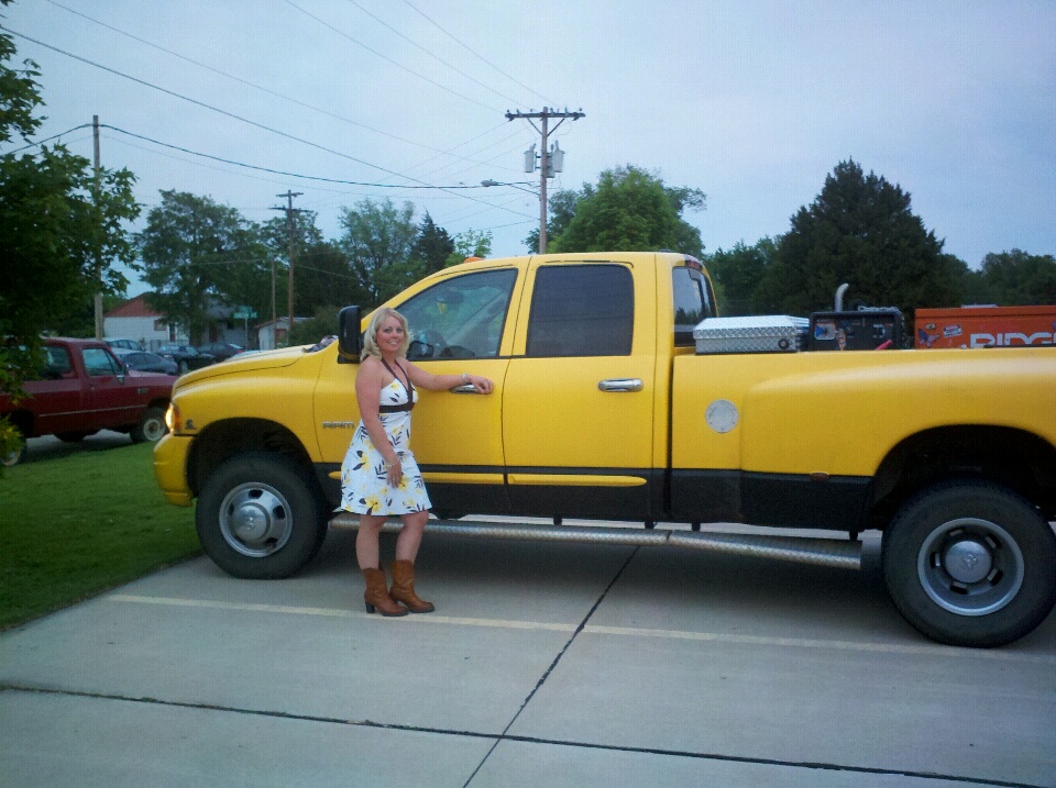 Me in dress and truck