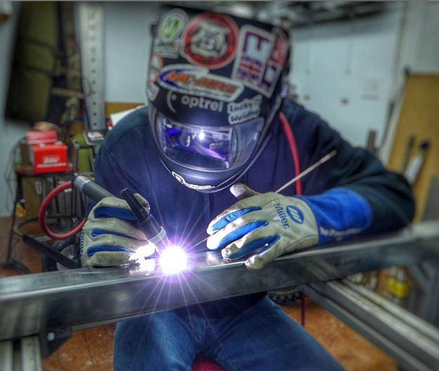 Dave Blackburn welding in Miller gloves